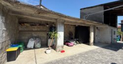 Casa Accostata Con Scoperto